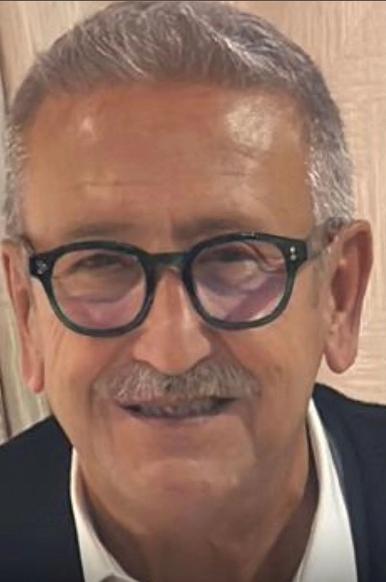 a man wearing glasses