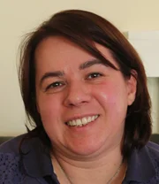 a woman smiling for the camera